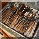 K15. Stainless flatware set. 